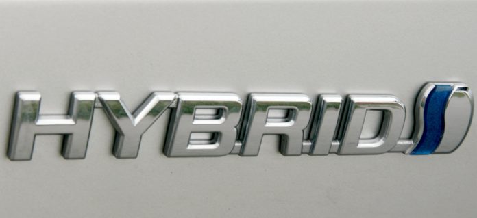 Toyota Corolla TS Hybrid skilt Hybrid